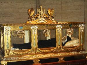 Saint Bernadette's body on display in Nevers, France. It has not decayed, but a layer of wax was placed over her face to cover some skin patches for presentablility.