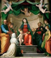 In this painting, Catherine of Siena is looked on with reverence.