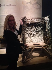 Whitney May by a privy at the Magna Carta exhibit at Houston's Museum of Natural Science